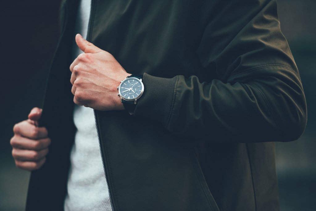 manwearingwatch-web Photo of a busy man wearing a watch