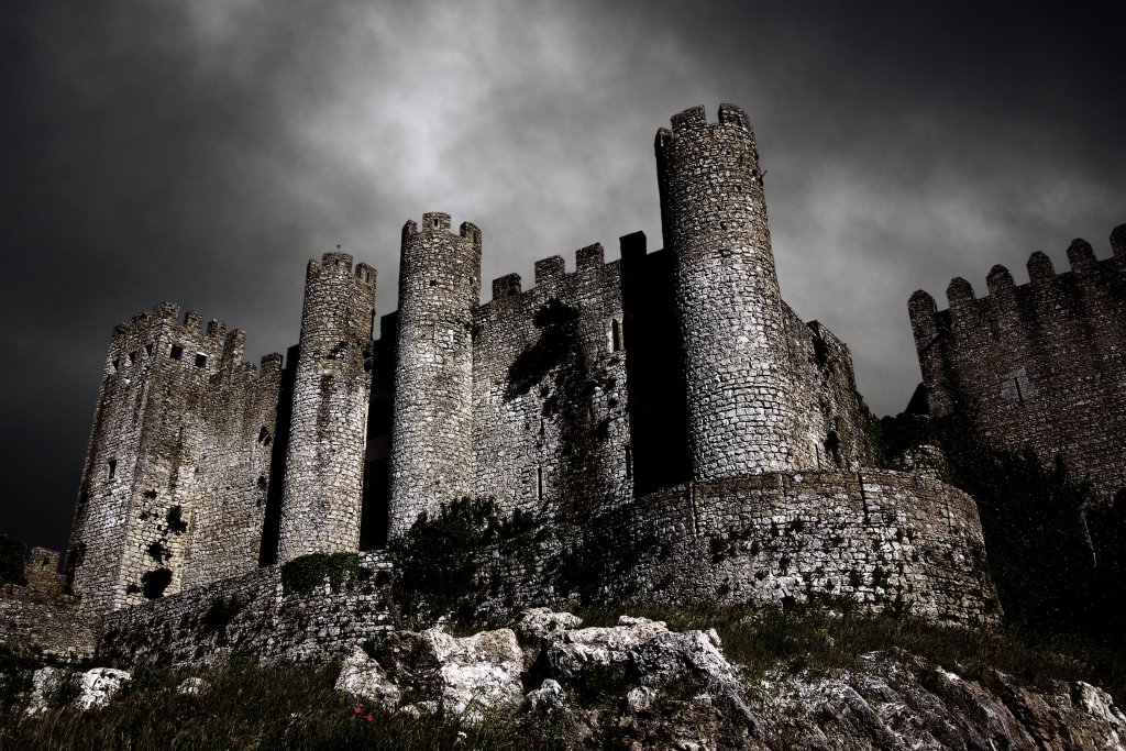 Dark Castle Disturbing scene with medieval castle at night with stormy sky